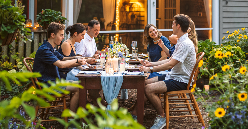 family celebrating in their back yard